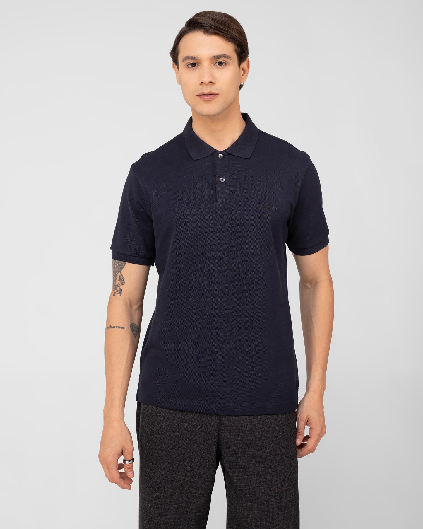 Premium navy polo shirt crafted from mercerised cotton pique in a timeless regular fit Tenhem