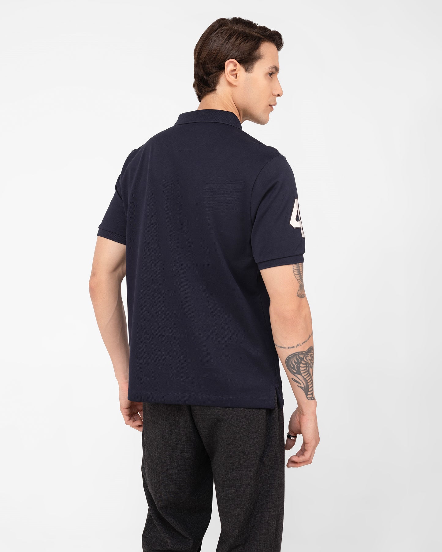 Premium navy blue mercerised cotton pique polo shirt with signature Cantermark emblem Tenhem