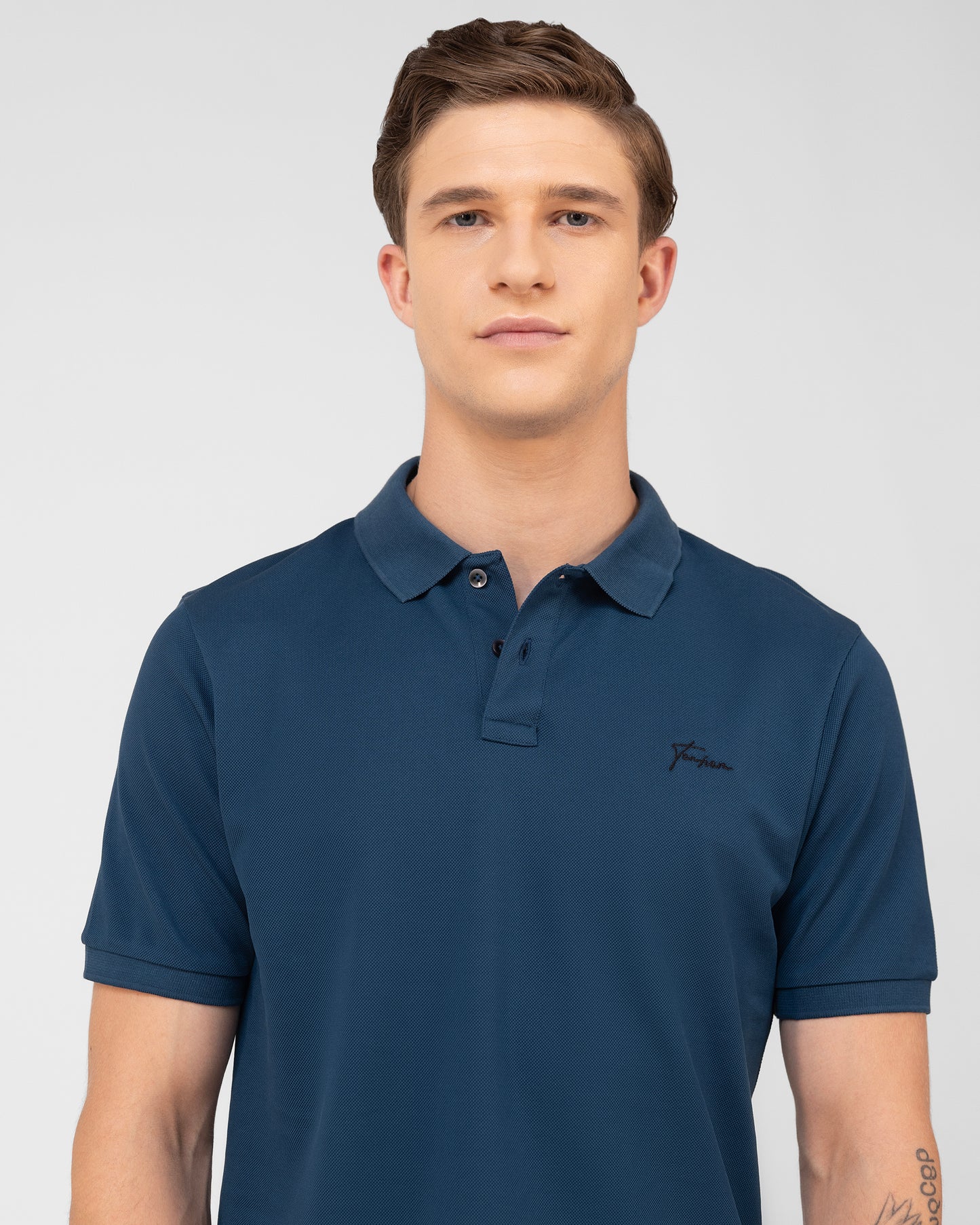 Classic teal polo shirt in mercerised cotton pique with refined structure and sheen Tenhem