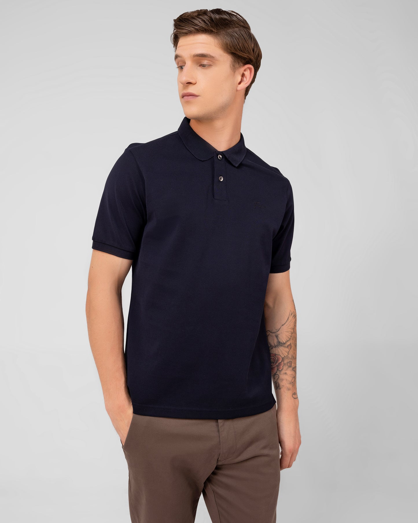 Branded navy polo shirt for men in soft mercerised cotton pique with timeless appeal – TENHEM


